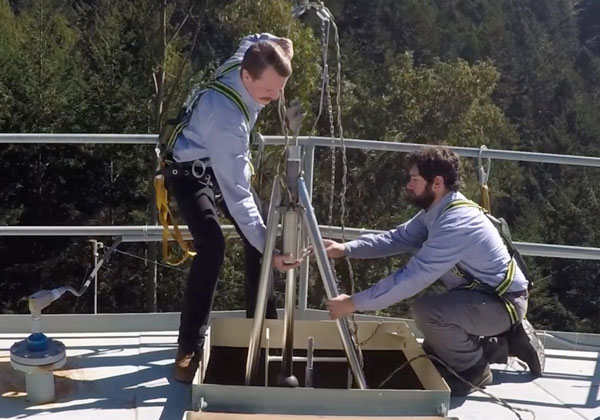 installing mixer through hatch in tank